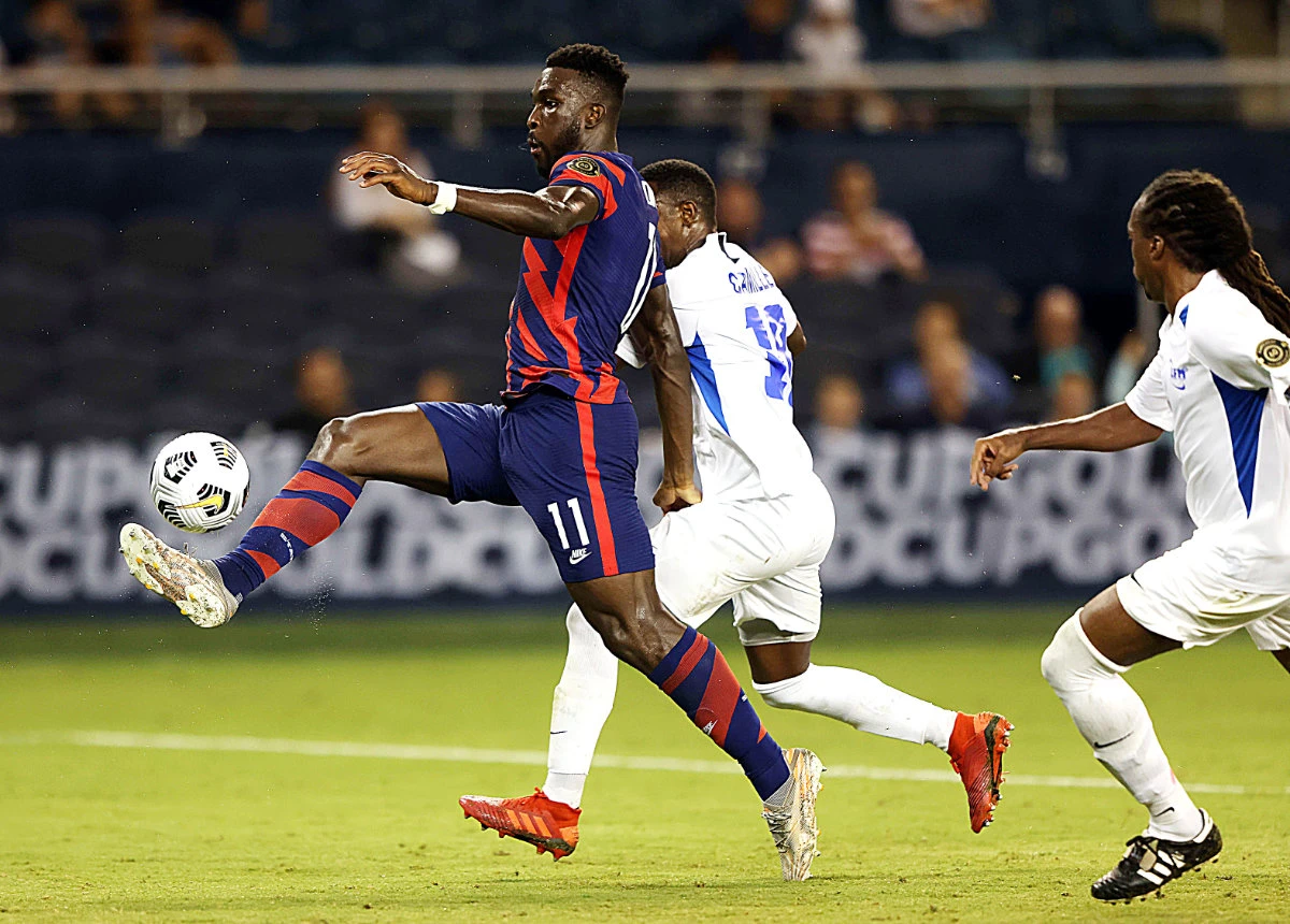 Dike scores twice as US rout Martinique 6-1 to clinch CONCACAF quarterfinals berth