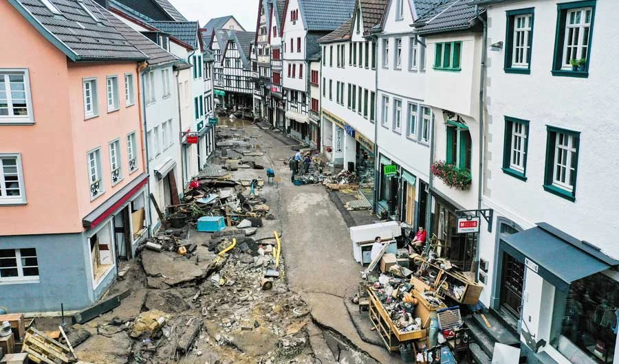 An aerial view taken on July 16, 2021 shows the destruction in the pedestrian area of Bad Muenstereifel, western Germany, after heavy rain hit parts of the country, causing widespread flooding. (AFP)