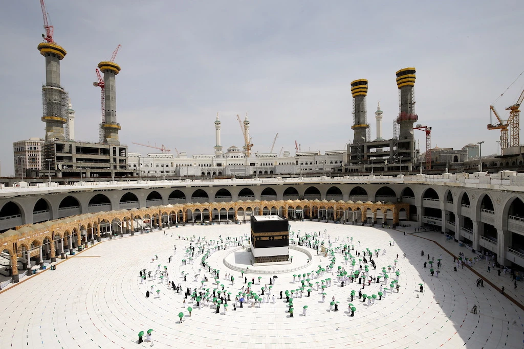 Pilgrims perform tawaf around the Kaaba in the Grand Mosque in Makkah, Saudi Arabia on July 17, 2021. (Reuters)