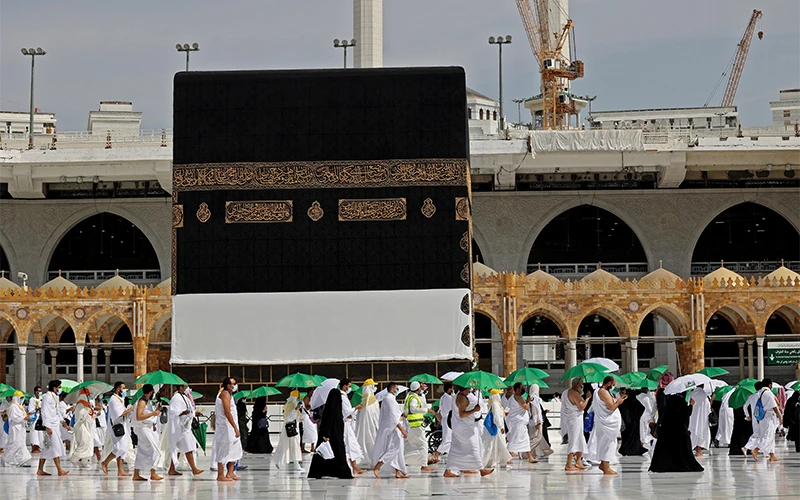 Groups of pilgrims flocked to the Grand Mosque while adhering to precautionary measures against COVID-19 to perform Hajj in Saudi Arabia on July 18, 2021. (AFP)