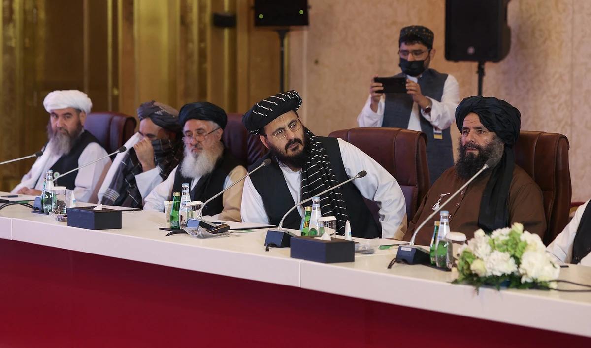 A delegation of Afghanistan's Taliban movement attends a session of the peace talks between the Afghan government and the Taliban in the Qatari capital Doha, on July 17, 2021. (AFP)