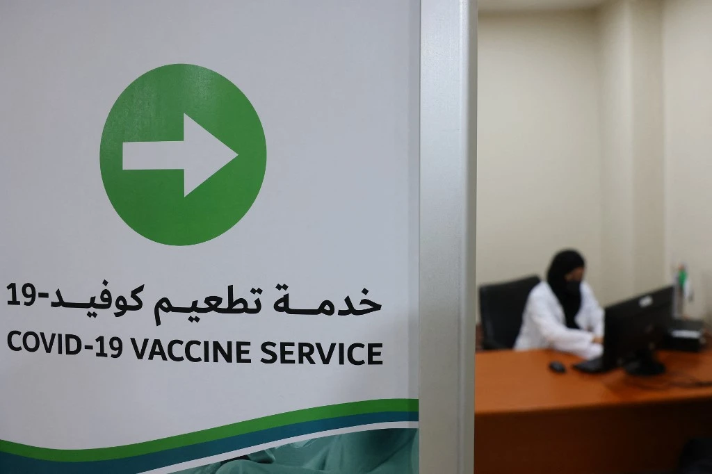 The UAE has administered 16,263,585 COVID-19 vaccine doses so far, for a vaccine distribution rate of 164.44 doses per 100 people. (AFP)