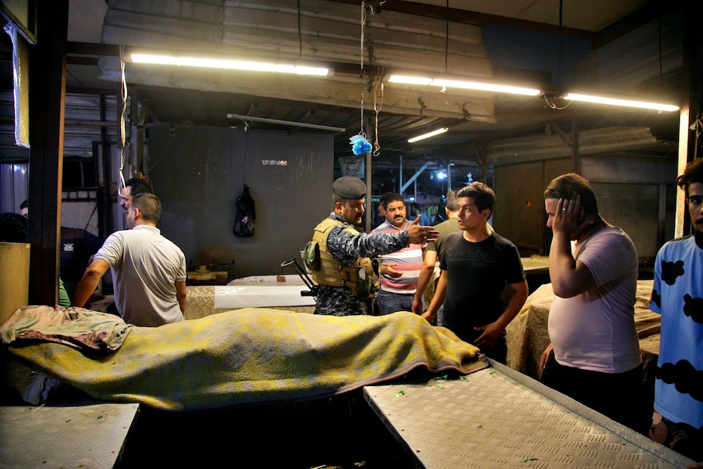 Iraq market bomb kills at least 35 on eve of Eid holiday