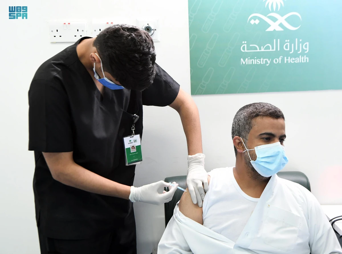 A man get his COVID-19 jab at a vaccination center in Abha. (SPA)