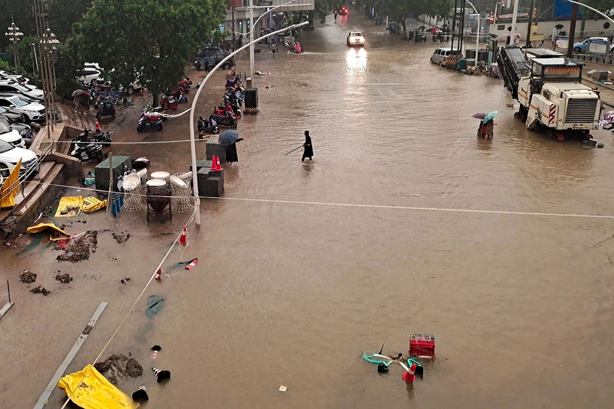 Once-in-millennium rainfall swamps central China province, killing at least 12