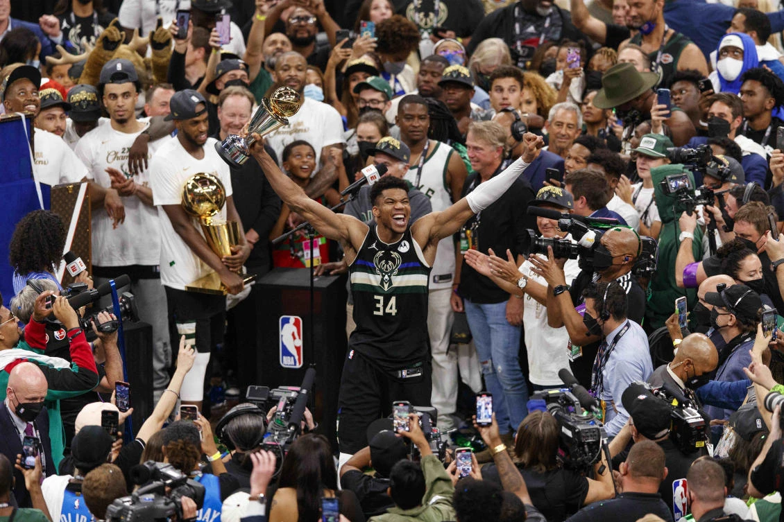 Giannis Antetokounmpo matched Michael Jordan and Hakeem Olajuwon as the only players to take NBA Finals MVP and NBA Defensive Player of the Year awards in the same season. (USA TODAY Sports)