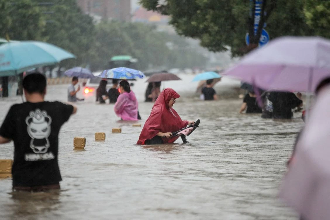 From the evening of Saturday until late Tuesday, 617.1 millimeters of rain fell in Zhengzhou, above, almost on par with its annual average of 640.8mm. (AFP)