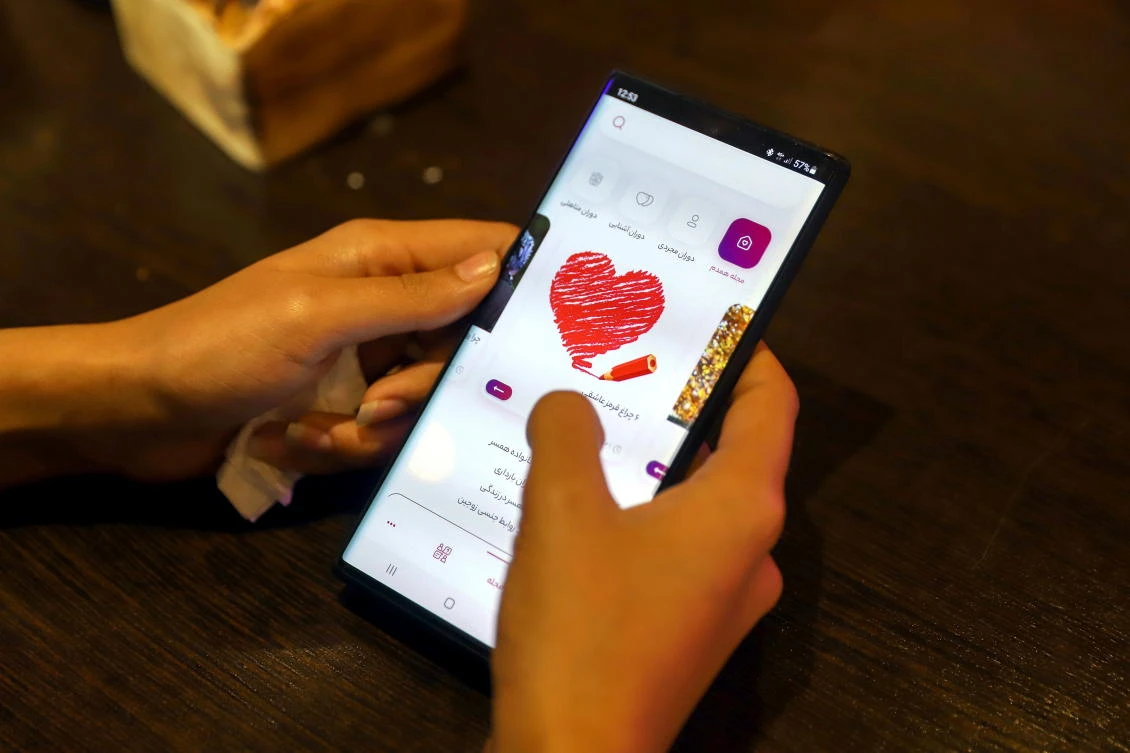The state-approved matchmaking app Hamdam (Companion) requires users to verify their identity and carries out psychological compatibility tests. (West Asia News Agency via Reuters)