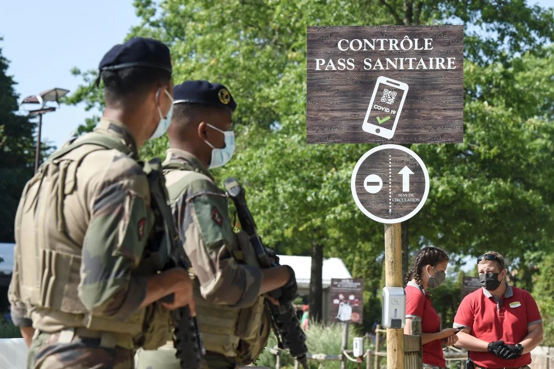 Above, French soldiers on patrol at the entrance of the Puy du Fou theme park in Les Epesses, western France on July 21, 2021. (AFP)