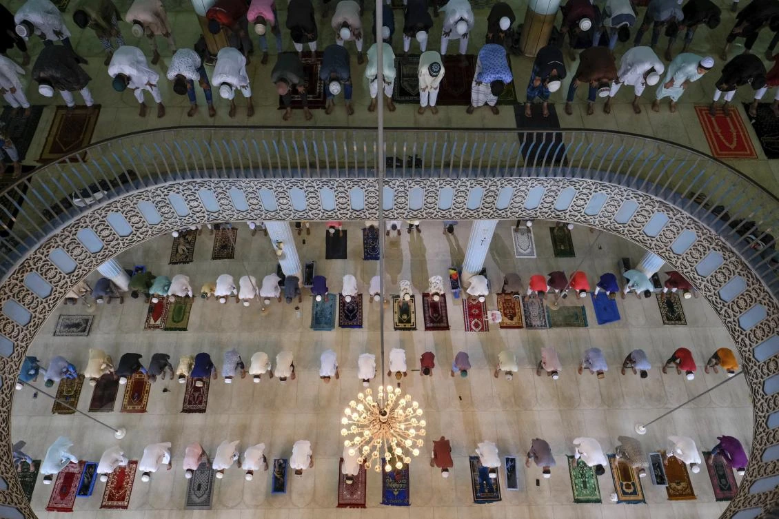 Muslims offer prayers on the morning of Eid-ul-Adha at Baitul Mukarram National Mosque in Dhaka, Bangladesh, July 21, 2021. Eid Al-Adha. (AP)