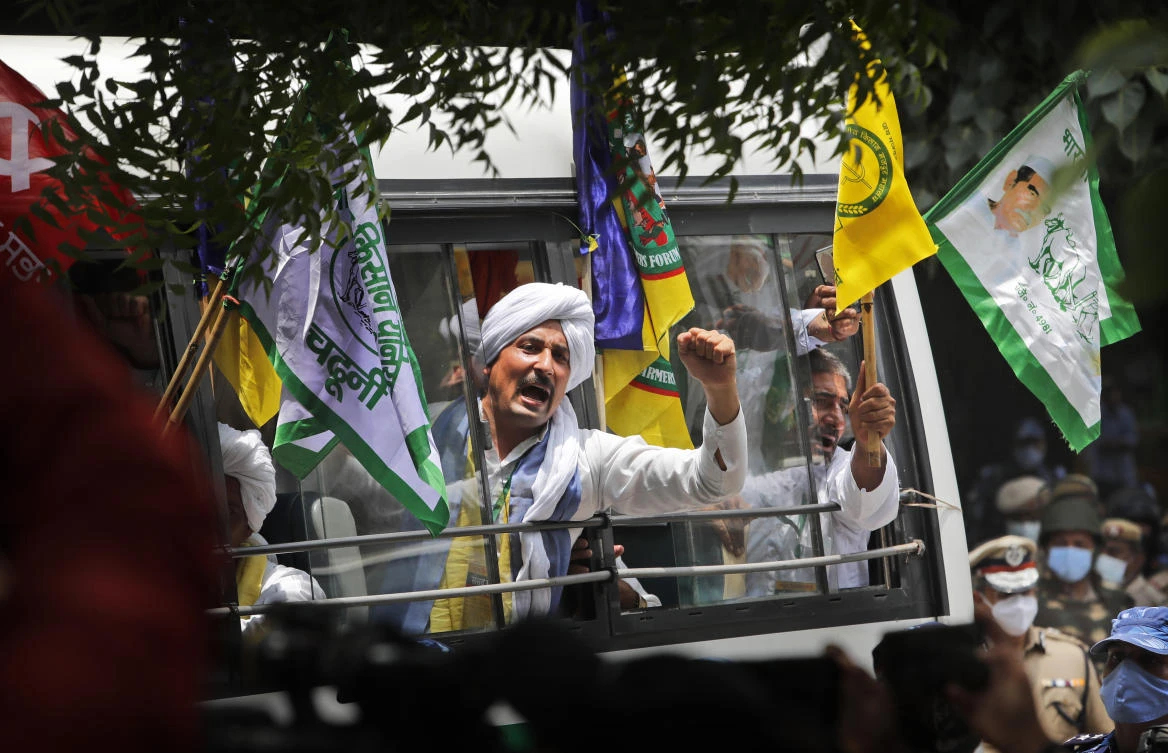 Indian farmers arrive at a protest site to hold mock farmer's parliament in New Delhi, India, Thursday, July 22, 2021. (AP)