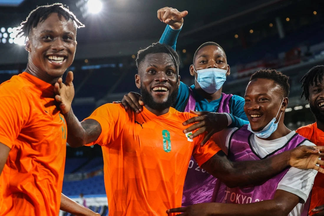 Ivory Coast’s midfielder Franck Kessie (C) celebrates with Ivory Coast’s forward Christian Kouame (L) and teammates after he scored his side’s second goal. (AFP)