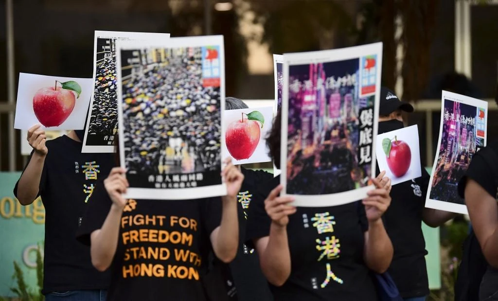 Four journalists at shut Hong Kong paper charged with collusion