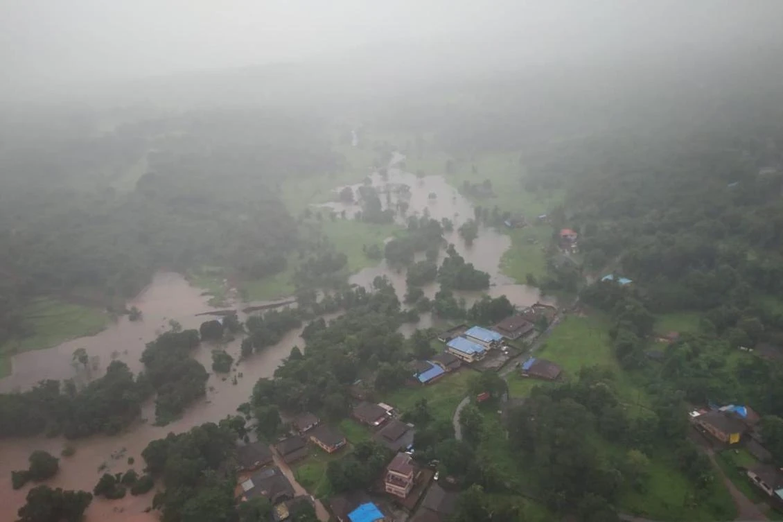 In this handout photo taken on July 22, 2021, by Indian Air Force (IAF) shows villages in low lying areas inundated with flood water after heavy monsoon rains in Ratnagiri, district of Maharashtra. (AFP)