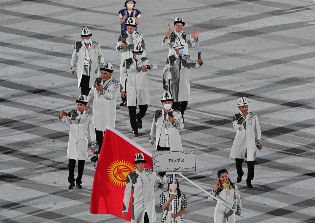 Maskless Kyrgyzstan, Tajikistan teams make for awkward moment at Olympic opening ceremoney