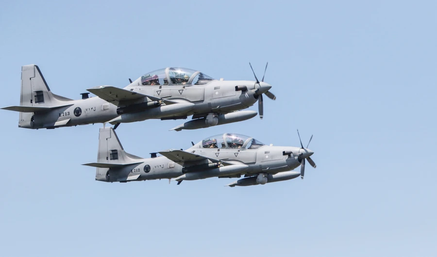 A-29 Super Tucano military aircrafts fly over targets during a drill by the Lebanese Airforce in the northern Lebanese village of Hamat on April 11, 2019. (AFP)