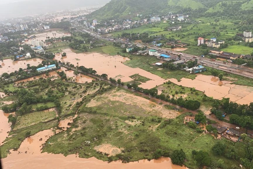 Downpours lasting several days have severely affected the lives of hundreds of thousands in India, while major rivers are in danger of bursting their banks. (Indian Navy via AFP)