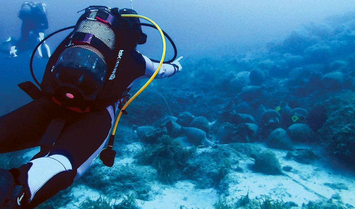 Scuba divers visit the underwater museum in the Aegean Sea, off the coast of the Greek island Alonissos on July 20. (AFP)