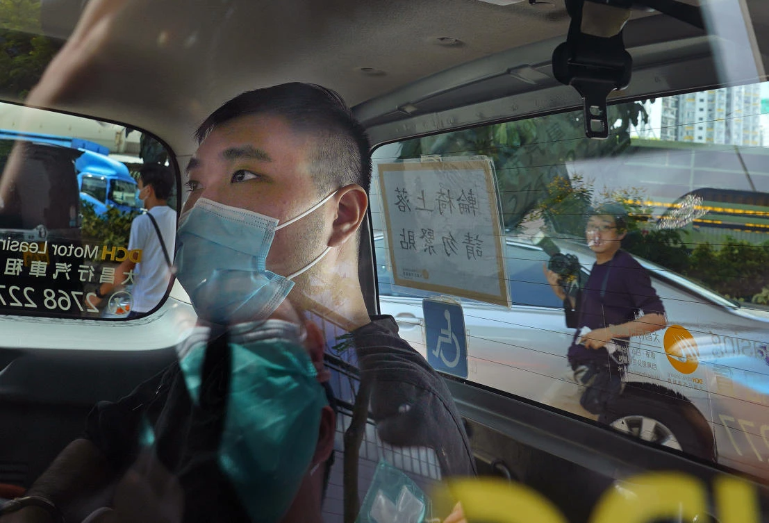 The verdict on the case of Tong Ying-kit, above, who is charged with inciting separatism and terrorism, is being closely watched for indications as to how similar cases will be dealt with in future. (AP)