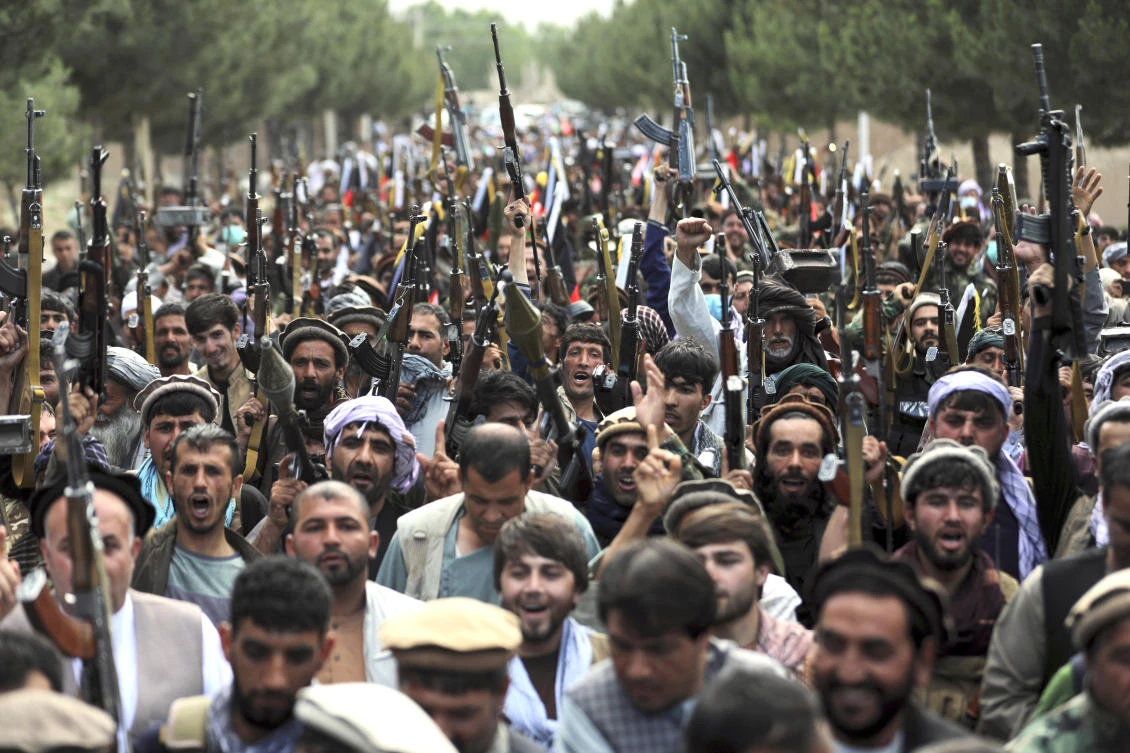 Afghan militiamen join defense and security forces during a gathering to mobilize local militias across the country to try to stem the tide of the latest Taliban gains. (AP)