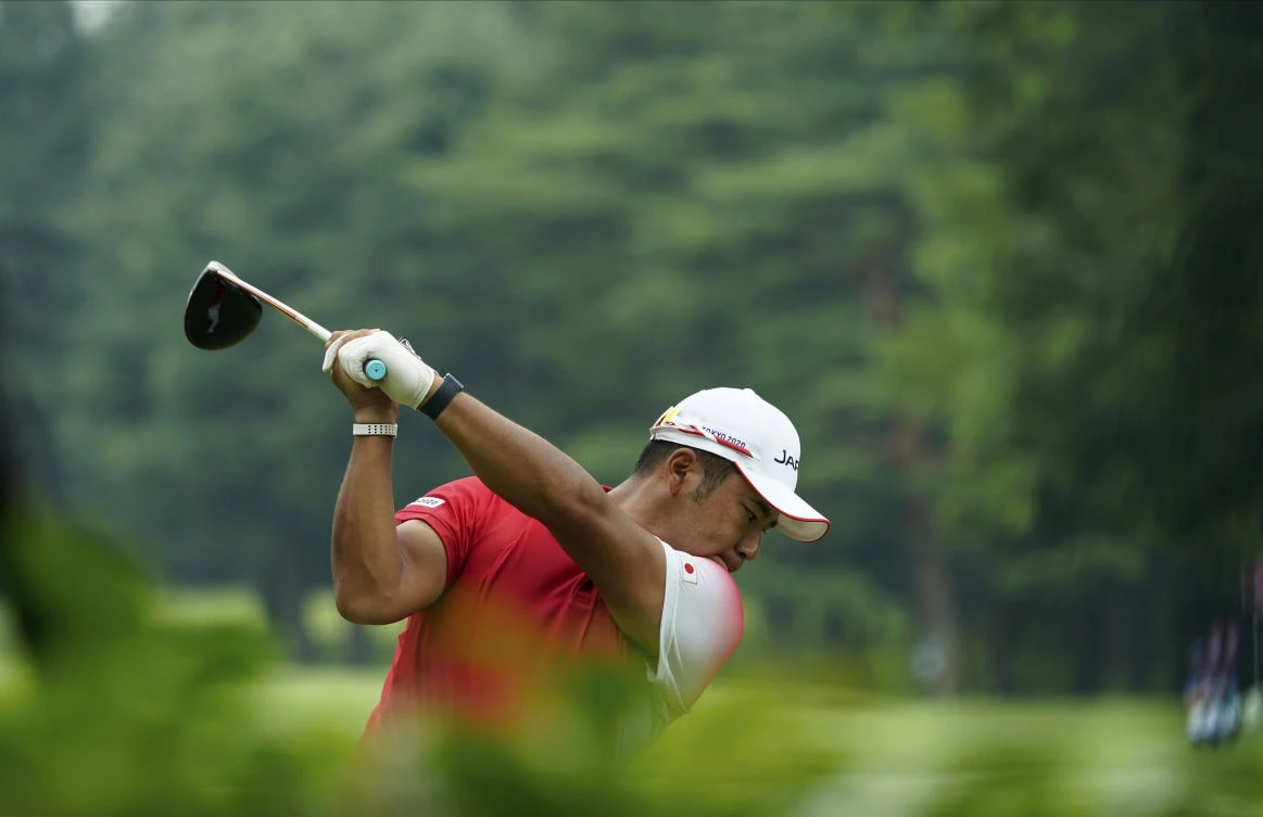 Japan's Hideki Matsuyama hits a tee shot on the 13th hole during the first round of the men's golf event at the 2020 Summer Olympics on Wednesday, July 28, 2021, at the Kasumigaseki Country Club in Kawagoe, Japan. (AP)