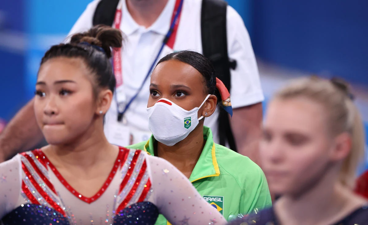 At the Tokyo 2020 Olympics, Rebeca Andrade of Brazil wearing a protective face mask looks on. Japan hit a record number of new virus cases on Thursday as Tokyo Olympics organizers dismissed any link to the nationwide surge. (Reuters)