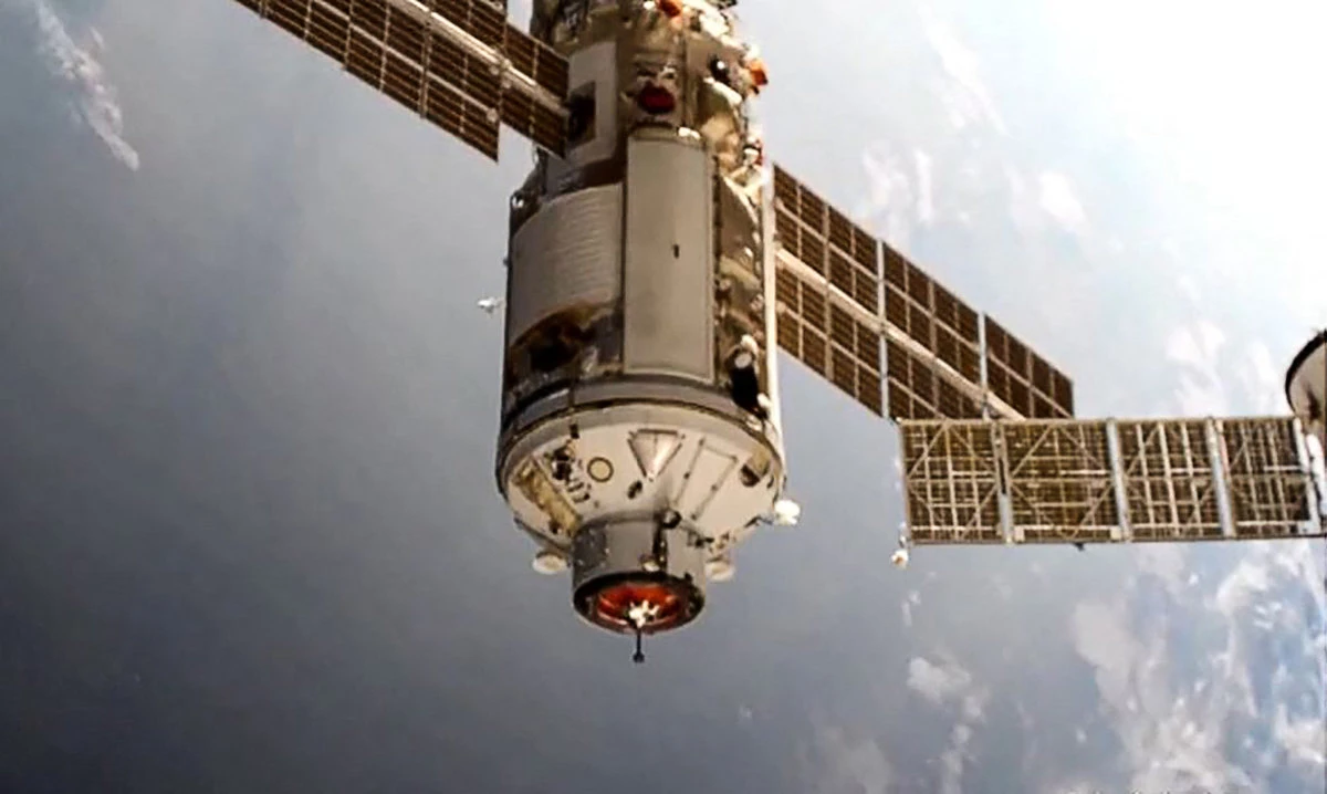 This photo released by the Russian Space Agency Roscosmos on July 29, 2021, shows the Russian Multipurpose Laboratory Module "Nauka" (Science) docking to the ISS. (AFP)