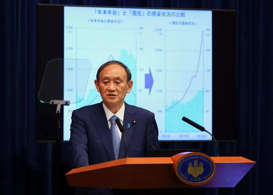 Japan expands virus emergency after record spikes amid Games