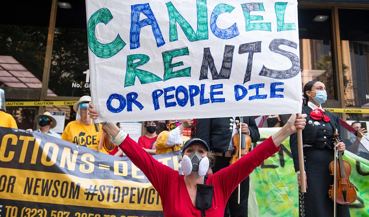 Renters and housing advocates attend a protest to cancel rent and avoid evictions in front of the court house amid Coronavirus pandemic in Los Angeles, California. (AFP/File)