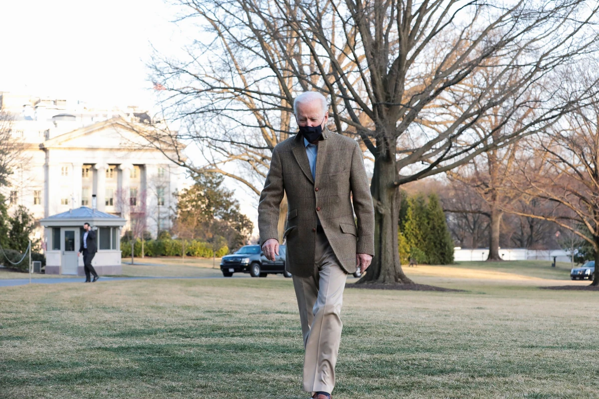 U.S. President Joe Biden walks, across the South Lawn of the White House, towards reporters, in Washington, U.S., March 14, 2021. (Reuters)