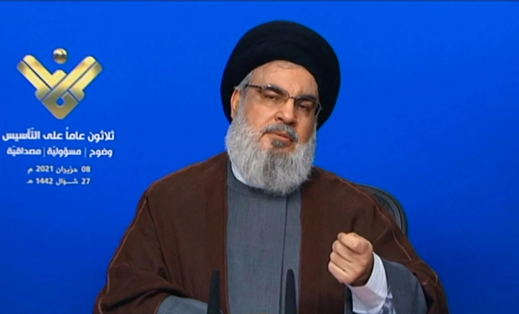 Hassan Nasrallah, chief of the Shiite Muslim movement Hezbollah, delivers a televised speech. (File/AFP)