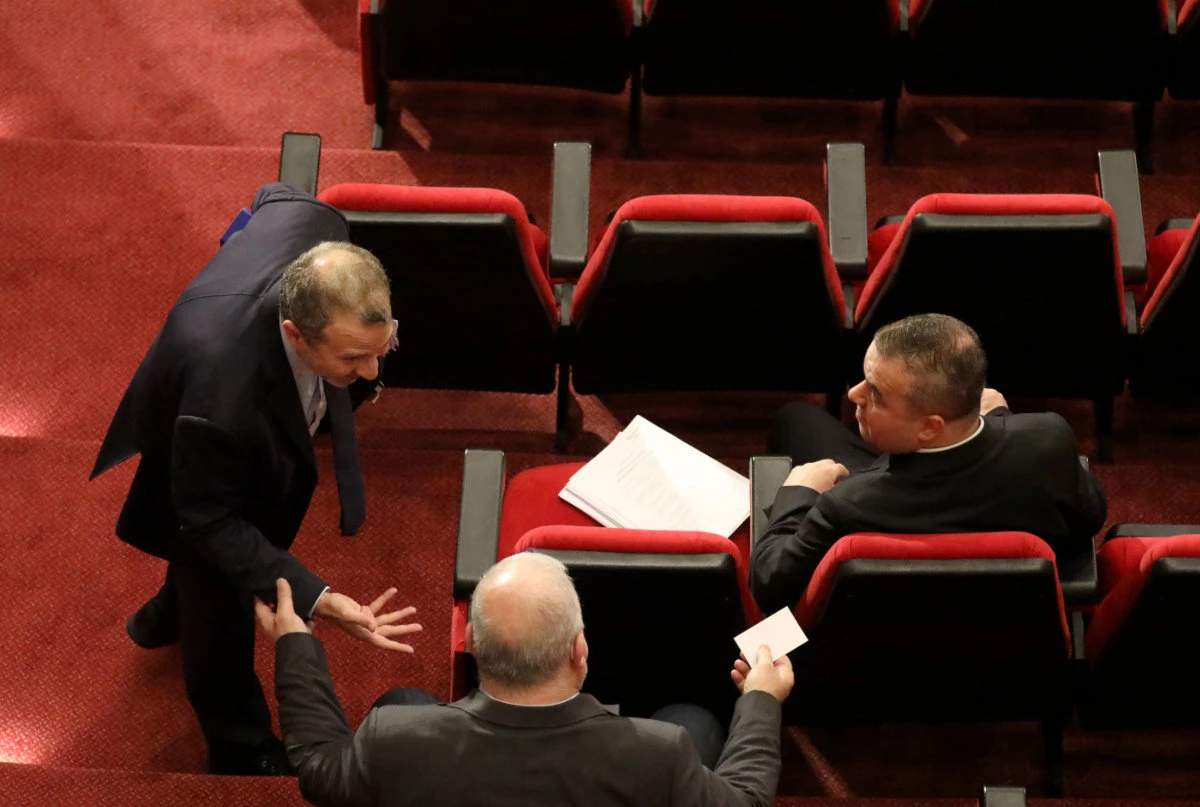 Gebran Bassil, leader of Lebanon's biggest Christian bloc, gestures as he talks with Mohamed Raad, head of Hezbollah's parliamentary bloc, before a legislative session at UNESCO Palace in Beirut on June 30, 2021. (REUTERS/Mohamed Azakir)