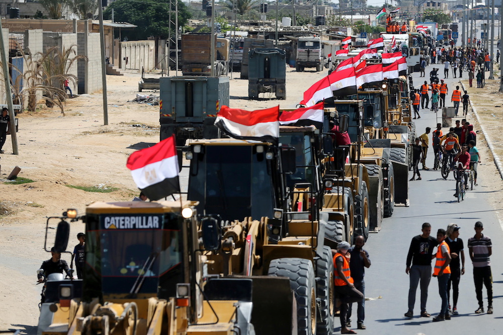 Building equipment, sent by Egypt, arrives in the southern Gaza Strip, June 4, 2021. (Reuters)