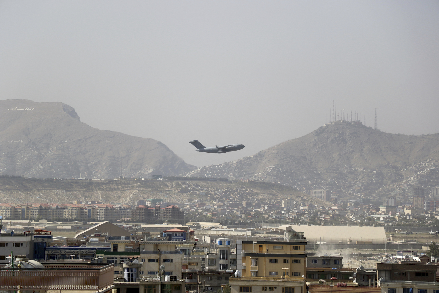A US military aircraft takes off at the Hamid Karzai International Airport in Kabul, Afghanistan, Saturday, Aug. 28, 2021. (AP)