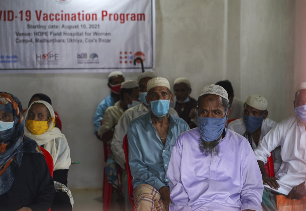 Rohingya refugees wait to get vaccinated against COVID-19, Cox’s Bazar, Bangladesh, Aug. 10, 2021. (AP Photo)