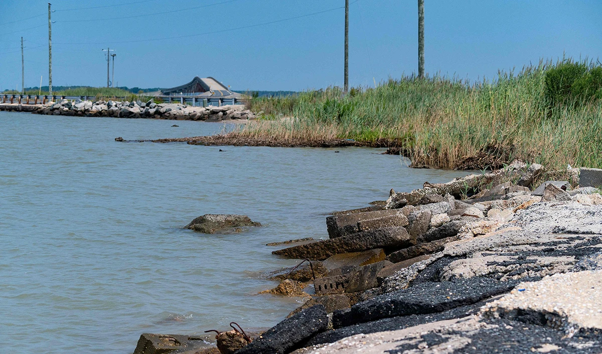 A man-made rock barrier stops the water from eroding the land on Hoopers Island, Maryland on August 9, 2021, where the evidence of climate change is being felt. (AFP)