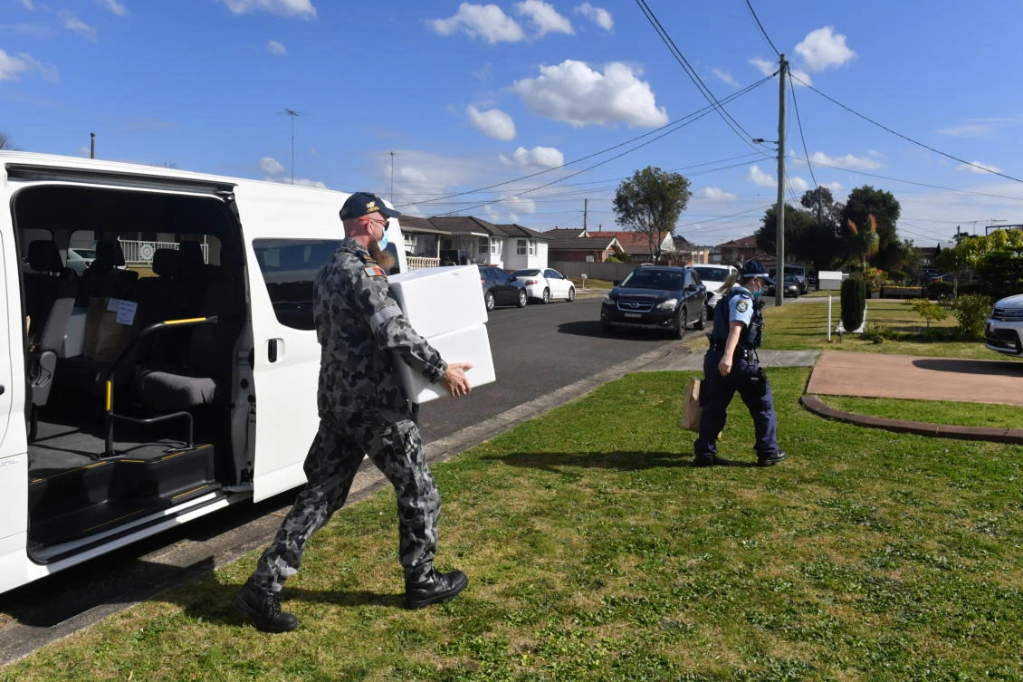 Troops to enforce Sydney lockdown as Brisbane extends coronavirus curbs