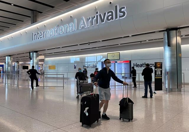 Passengers arrive from international flights at Heathrow Airport, as the spread of the coronavirus disease (COVID-19) continues, in London, Britain, May 10, 2020. (Reuters)
