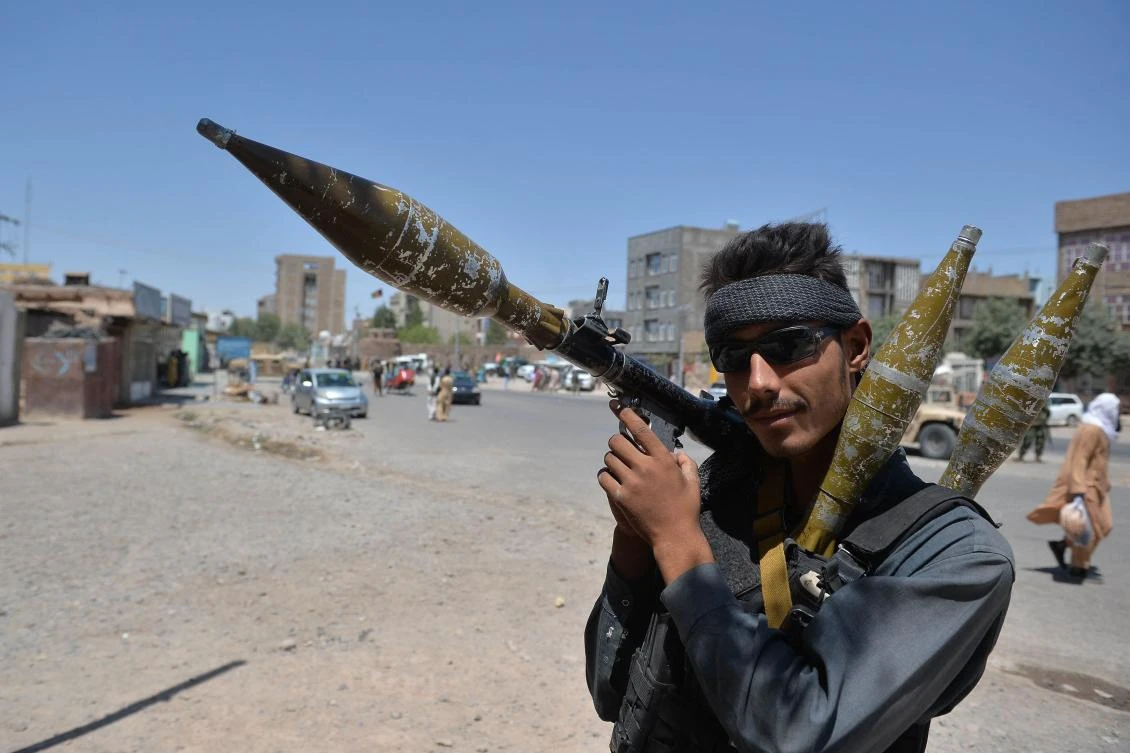 The hard-line Islamist group Taliban are meeting resistance as they try to take provincial capitals in Afghanistan. Above, a policeman with rocket-propelled grenade in Herat. (AFP)