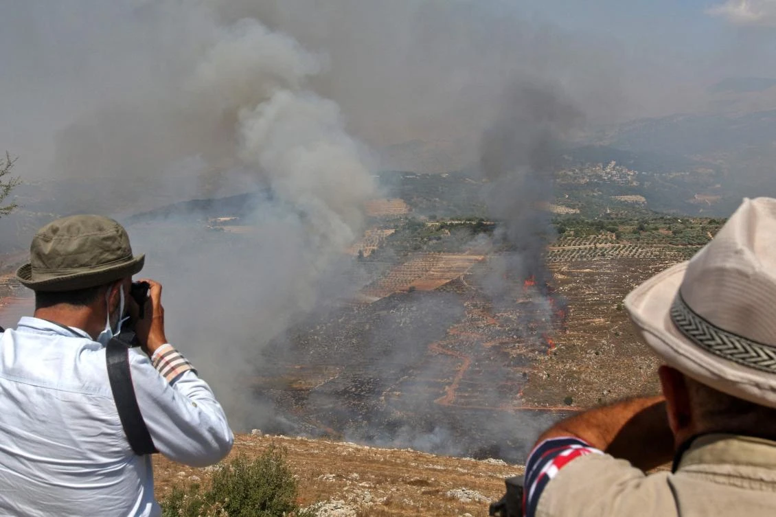 Smoke billows from shelling by Israeli forces in the town of Ibl Al-Saqi, southern Lebanon. (AFP)
