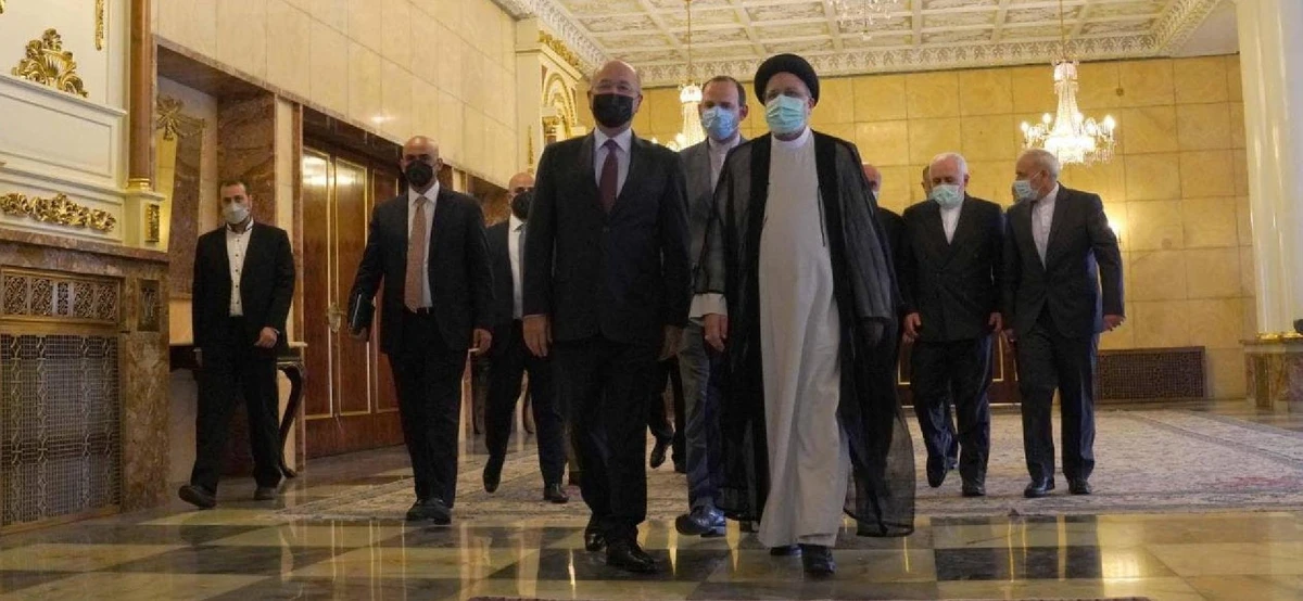 Iraqi President Barham Salih pictured next to his Iranian counterpart, President Ebrahim Raisi. (NASA)