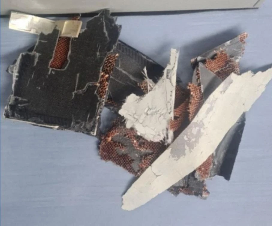 In this photo released by the US Central Command, taken by the US Navy, and received by AFP on August 6, 2021, shows parts of a UAV after an attack against motor tanker Mercer Street. (AFP)