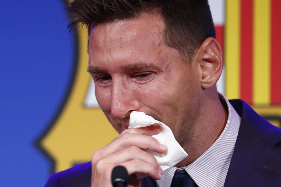 Lionel Messi cries at the start of a press conference in Barcelona, Spain, Sunday, Aug. 8, 2021. (AP Photo/Joan Monfort)