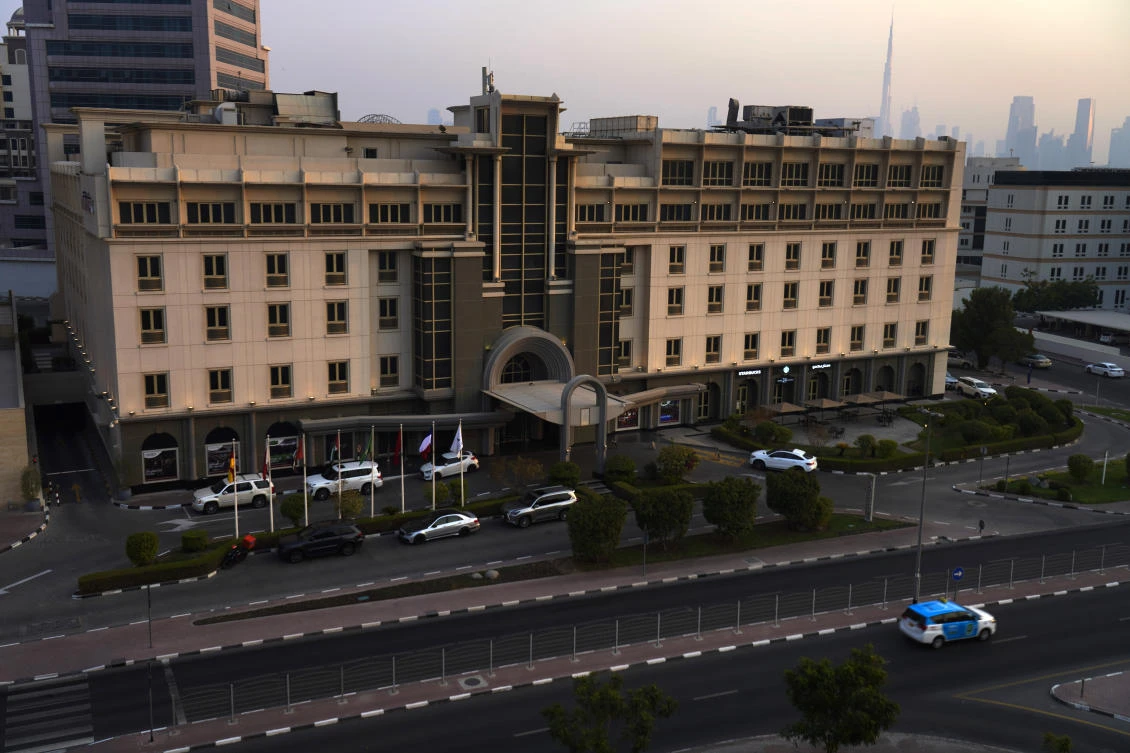 Some foreign contractors who powered the logistics of America's forever war in Afghanistan have now found themselves stranded on an unending layover in Dubai at the Movenpick without a way to get home. (AP Photo)