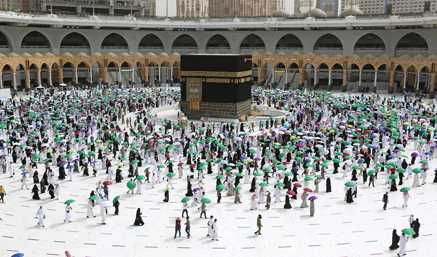 Worshippers perform the farewell tawaf (circumambulation) around the Kaaba, Islam's holiest shrine, at the Grand mosque in the holy Saudi city of Makkah on July 22, 2021. (AFP)