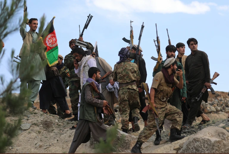 Afghan militiamen join Afghan defence and security forces during a gathering in Kabul. (AP)