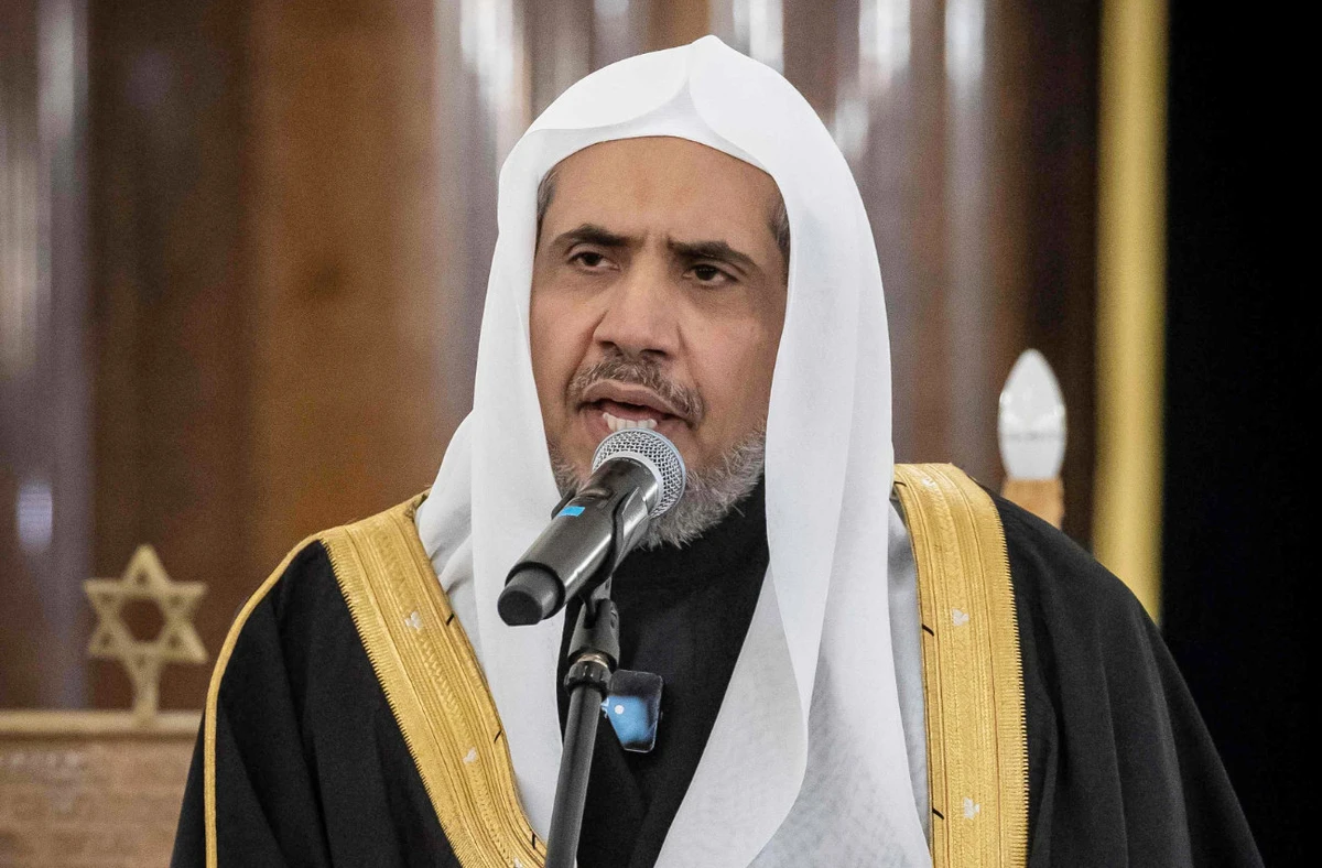 Secretary General of the Muslim World League Mohammad Abdulkarim al-Issa gives a speech during a visit to the Nozyk Synagogue on January 24, 2020 in Warsaw. (AFP)