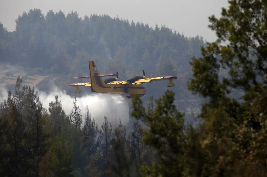 Greek wildfires: Multinational force works to tame flare-ups