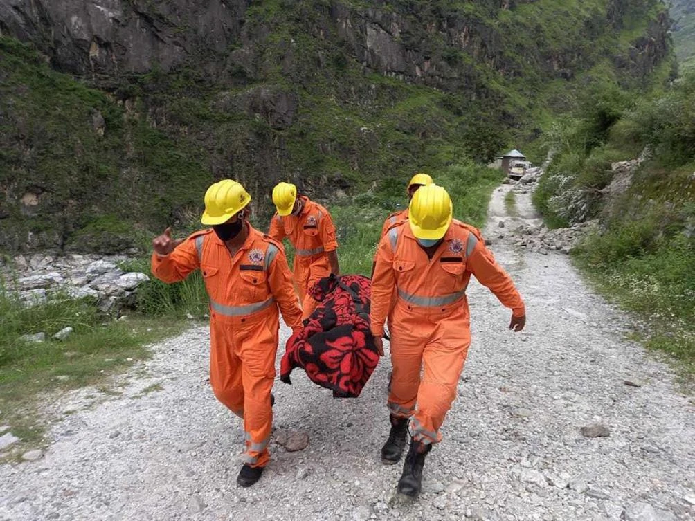 National Disaster Response Force (NDRF) soldiers carrying the body of a victim from the site of a landslide in Kinnaur district in the northern Indian state of Himachal Pradesh on Aug. 11, 2021. (File/AP)