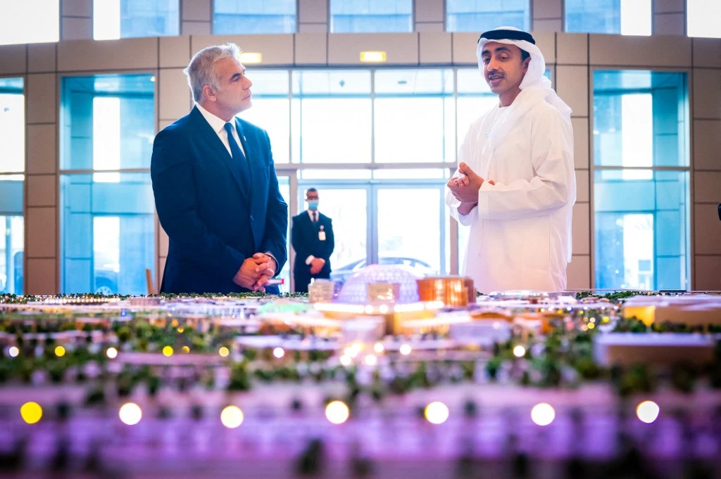 United Arab Emirates Minister of Foreign Affairs and International Co-operation Sheikh Abdullah bin Zayed bin Sultan Al-Nahyan (R) meeting with Israel's top diplomat Yair Lapid in Abu Dhabi. (AFP/WAM)